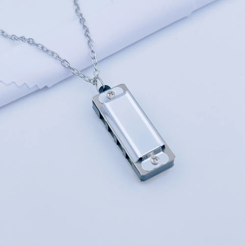 New 4-hole 8-tone Necklace Harmonica Metal Woodwind Harmonica Chain Mini Mini Musical Instrument Gift