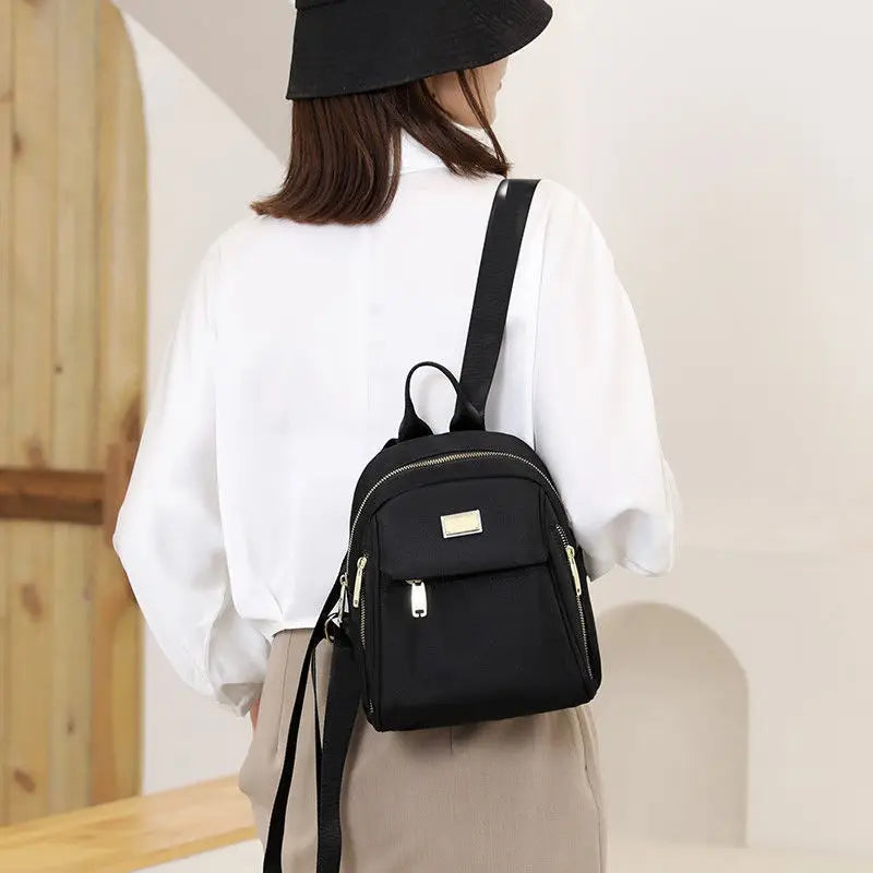 New Design Women's Compact Backpack Crossbody Shoulder Bag Convertible Mini Oxford Fabric Lightweight Casual Outdoor Daypack